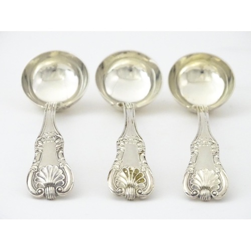 587 - Three 19thC Scottish silver King's pattern cream ladles hallmarked Glasgow 1830, maker WM AM. Approx... 