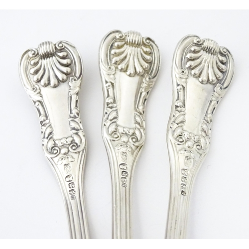 587 - Three 19thC Scottish silver King's pattern cream ladles hallmarked Glasgow 1830, maker WM AM. Approx... 