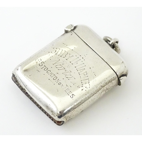 592 - A silver vesta case engraved 'Ashby W Warner, Norton, Stockton on Tees', hallmarked Chester 1900, ma... 