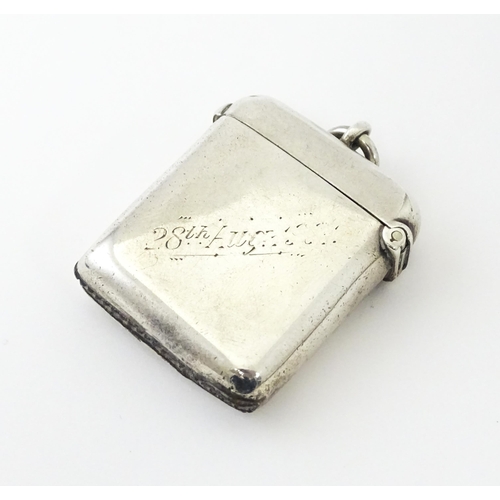 592 - A silver vesta case engraved 'Ashby W Warner, Norton, Stockton on Tees', hallmarked Chester 1900, ma... 