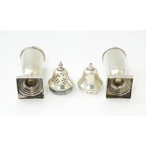 603 - A silver cruet set comprising salt and pepper, hallmarked Sheffield 1938, maker Viner's Ltd. Approx.... 