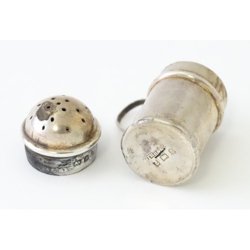 615 - Two small novelty silver pepperettes of flour shaker form, one Victorian example hallmarked Birmingh... 