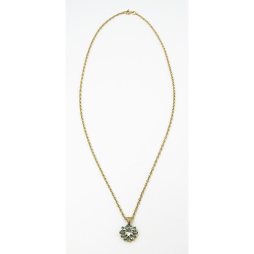 820 - A 9ct gold pendant set with white and aqua coloured stones, with chain necklace. The chain approx 20... 