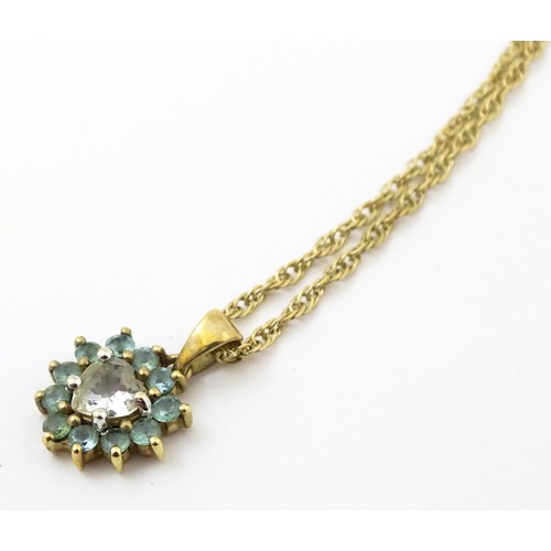 820 - A 9ct gold pendant set with white and aqua coloured stones, with chain necklace. The chain approx 20... 