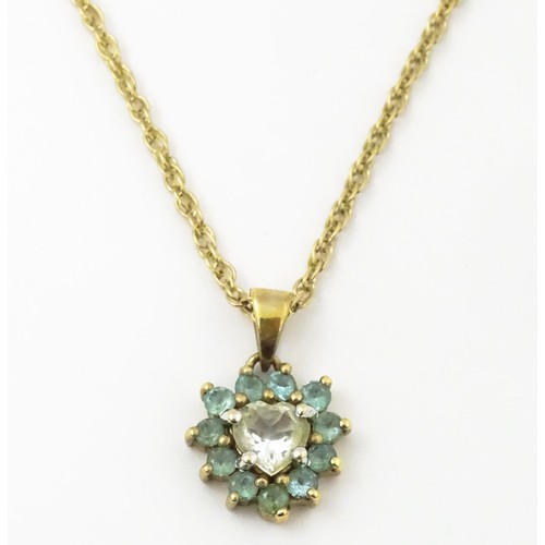 820 - A 9ct gold pendant set with white and aqua coloured stones, with chain necklace. The chain approx 20... 