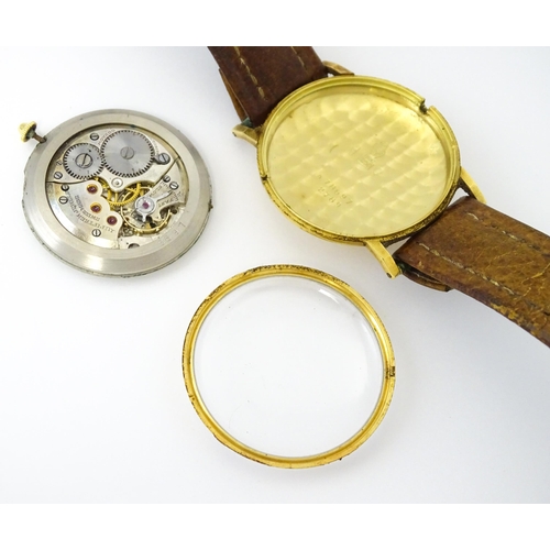 1028 - An 18ct gold cased gentleman's Movado wristwatch the silvered dial with Arabic numerals and subsidia... 