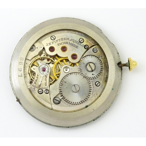 1028 - An 18ct gold cased gentleman's Movado wristwatch the silvered dial with Arabic numerals and subsidia... 