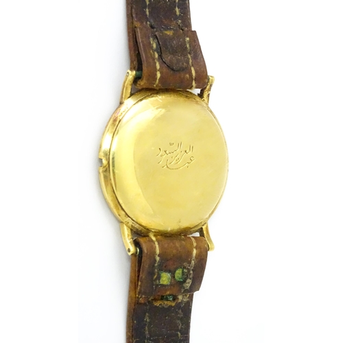 1028 - An 18ct gold cased gentleman's Movado wristwatch the silvered dial with Arabic numerals and subsidia... 