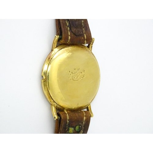 1028 - An 18ct gold cased gentleman's Movado wristwatch the silvered dial with Arabic numerals and subsidia... 