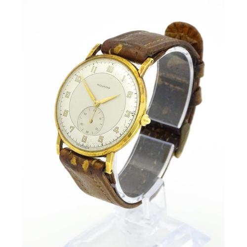 1028 - An 18ct gold cased gentleman's Movado wristwatch the silvered dial with Arabic numerals and subsidia... 