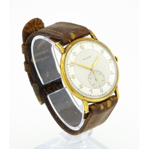 1028 - An 18ct gold cased gentleman's Movado wristwatch the silvered dial with Arabic numerals and subsidia... 