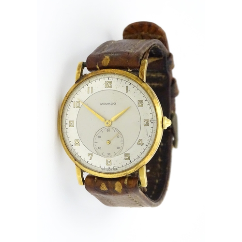 1028 - An 18ct gold cased gentleman's Movado wristwatch the silvered dial with Arabic numerals and subsidia... 