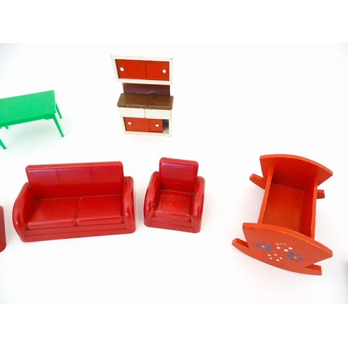 1188 - Toys: A quantity of assorted dolls house furniture to include beds, chest of drawers, basin, bath an... 