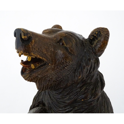 1477 - A late 19thC German carved Black Forest stick stand / umbrella stand of stand bear form. Approx. 34 ... 