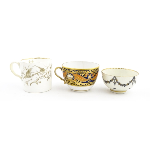 107 - Two 19thC tea cups comprising one with banded foliate and lion mask detail, and another with bird de... 