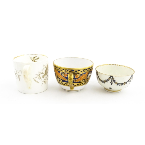 107 - Two 19thC tea cups comprising one with banded foliate and lion mask detail, and another with bird de... 