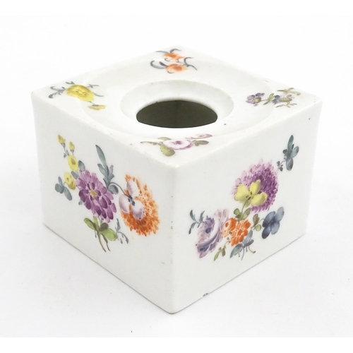 126 - Two German porcelain items comprising an inkwell of squared form with hand painted floral decoration... 