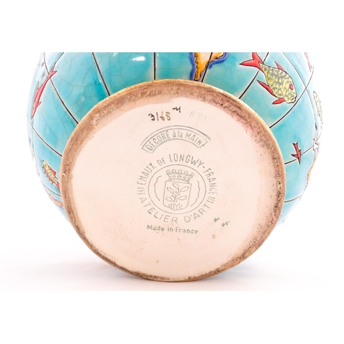 129 - A Longwy Boule Coloniale Mappemonde world map / globe vase designed by Maurice Paul Chevallier. Appr... 