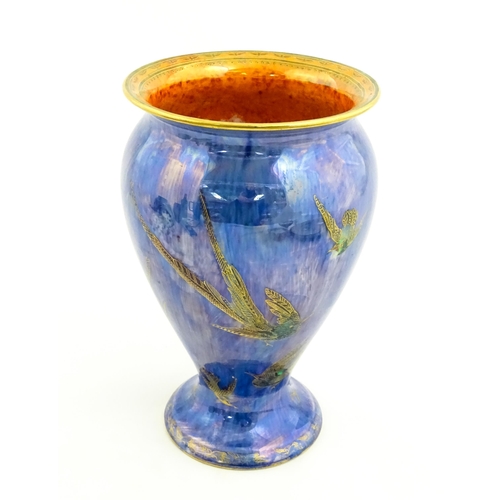 130 - A Wedgwood Fairyland lustre vase decorated in the Hummingbirds pattern, designed by Daisy Makeig-Jon... 