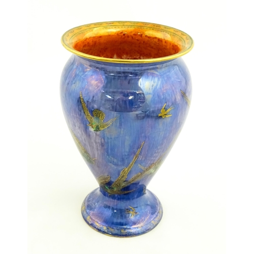 130 - A Wedgwood Fairyland lustre vase decorated in the Hummingbirds pattern, designed by Daisy Makeig-Jon... 