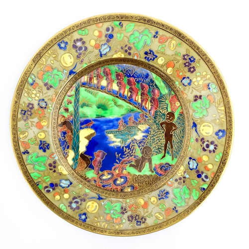 131 - A Wedgwood Fairyland lustre plate decorated in the Imps on a Bridge - Roc Centre pattern, designed b... 