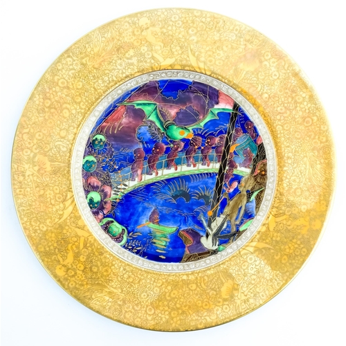 133 - A Wedgwood Fairyland lustre plate decorated in the Imps on a Bridge - Roc Centre pattern, designed b... 