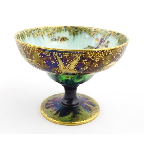 135 - A Wedgwood fairyland lustre pedestal bowl decorated with fairies, elves and imps, designed by Daisy ... 