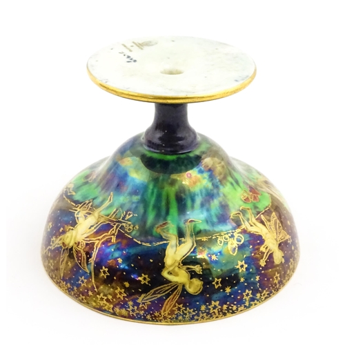 135 - A Wedgwood fairyland lustre pedestal bowl decorated with fairies, elves and imps, designed by Daisy ... 