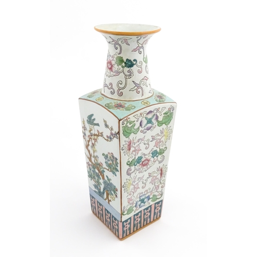 1 - A Chinese famille rose vase of squared form decorated with flowers, foliage and birds. Character mar... 