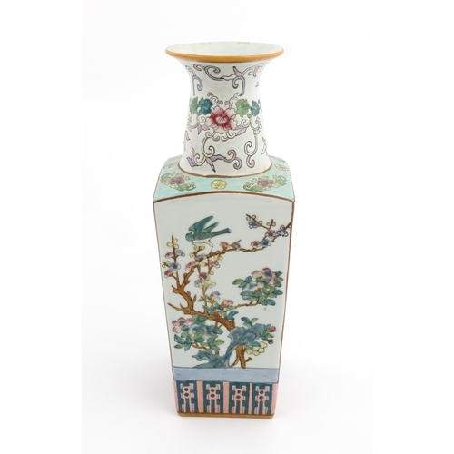 1 - A Chinese famille rose vase of squared form decorated with flowers, foliage and birds. Character mar... 