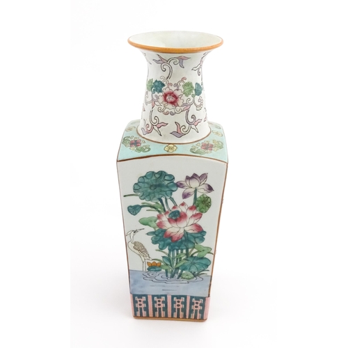 1 - A Chinese famille rose vase of squared form decorated with flowers, foliage and birds. Character mar... 