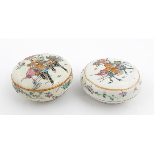 13 - Two Chinese famille rose ink boxes of circular form decorated with two figures riding Longma the win... 