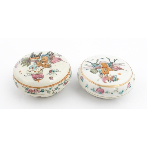 13 - Two Chinese famille rose ink boxes of circular form decorated with two figures riding Longma the win... 