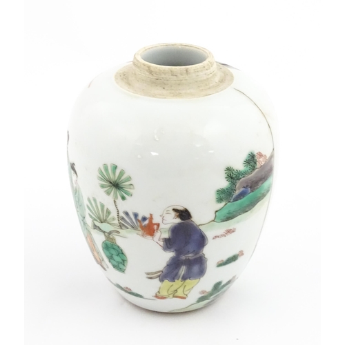 16 - A Chinese famille rose vase / jar decorated with figures in a landscape. Approx. 6