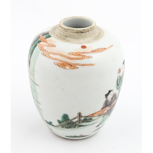 16 - A Chinese famille rose vase / jar decorated with figures in a landscape. Approx. 6