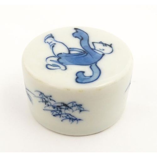 19 - Four Chinese items to include a famille rose brush washer with Character script detail, a blue and w... 