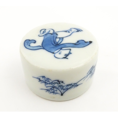 19 - Four Chinese items to include a famille rose brush washer with Character script detail, a blue and w... 