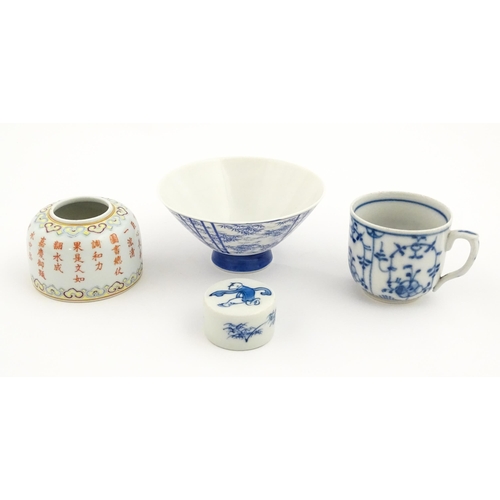 19 - Four Chinese items to include a famille rose brush washer with Character script detail, a blue and w... 