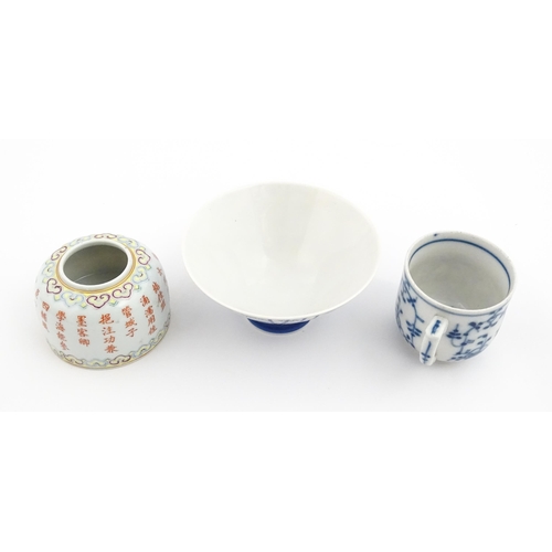 19 - Four Chinese items to include a famille rose brush washer with Character script detail, a blue and w... 