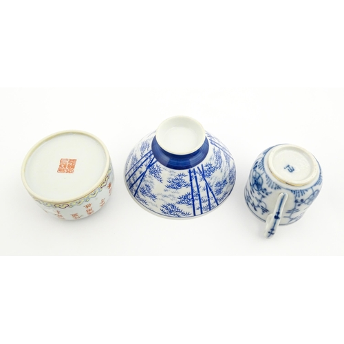 19 - Four Chinese items to include a famille rose brush washer with Character script detail, a blue and w... 