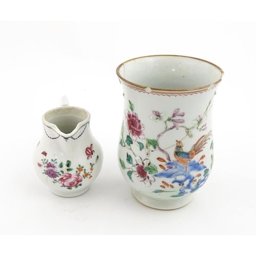 50 - A Chinese famille rose tankard decorated with flowers, foliage and Asiatic pheasant. Together with a... 