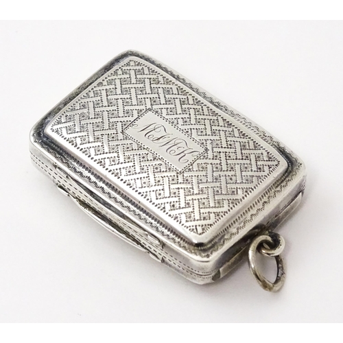 345 - A George III silver vinaigrette with engraved decoration, opening to reveal pierced grille and gilde... 