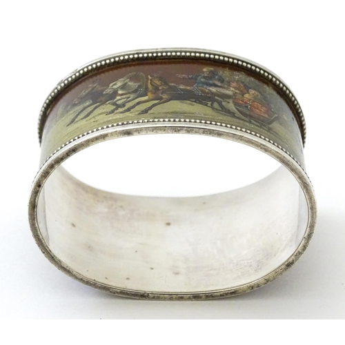 347 - A Russian silver napkin ring with lacquered and hand painted decoration depicting figures in a troik... 