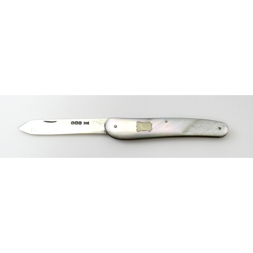 349 - A silver folding fruit knife with mother of pearl handle, hallmarked Sheffield 1927, maker Walker & ... 