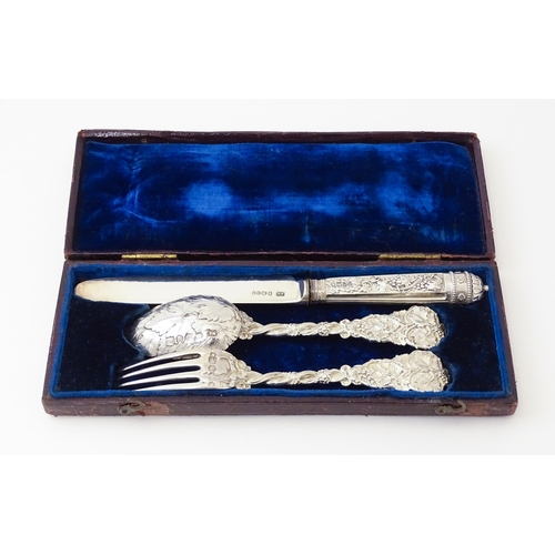 352 - A cased George IV silver three piece Christening set comprising knife, fork and spoon, with fruiting... 