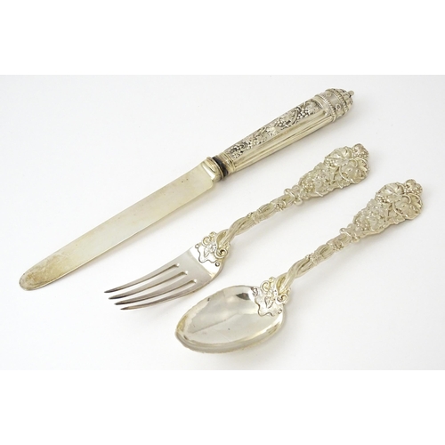 352 - A cased George IV silver three piece Christening set comprising knife, fork and spoon, with fruiting... 