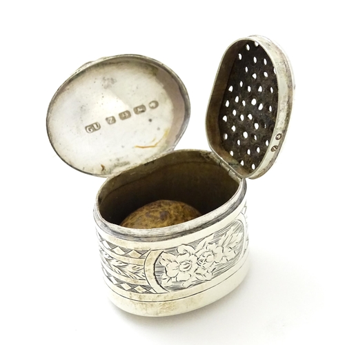 354 - A Victorian silver nutmeg grater with engraved decoration, hallmarked Birmingham 1899, maker George ... 