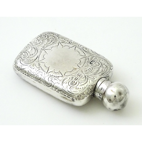 355 - A Victorian silver scent bottle / perfume flask with engraved decoration hallmarked Chester 1894, ma... 