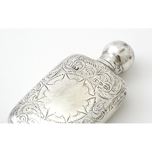 355 - A Victorian silver scent bottle / perfume flask with engraved decoration hallmarked Chester 1894, ma... 