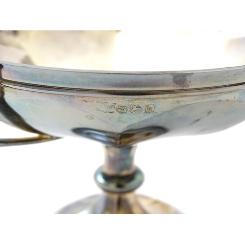 356 - A silver twin handled pedestal dish hallmarked Birmingham 1909, maker Mappin & Webb Ltd. Approx. 5